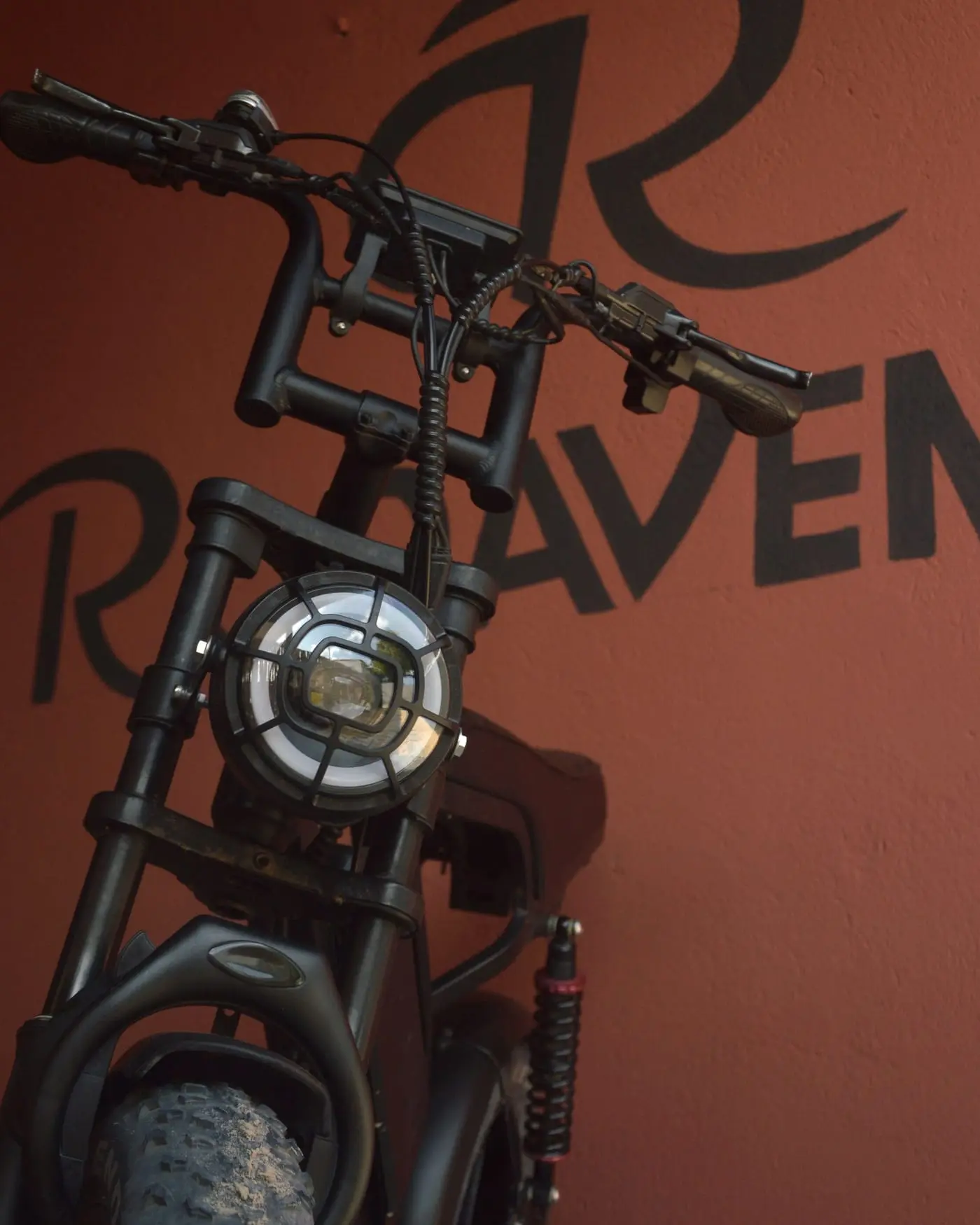LED headlight of the RV Max electric bike in front of the Rodavento logo